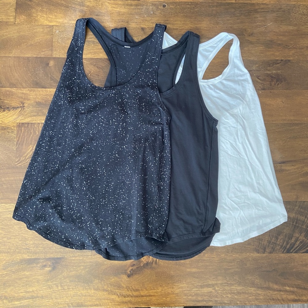 3 size 4 Lululemon tanks!